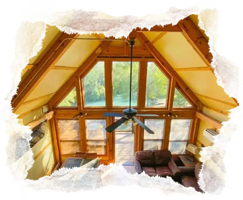 A picture of an attic with the windows open.